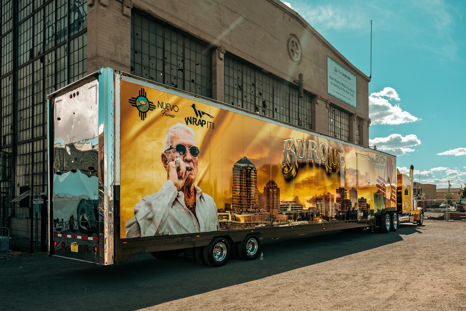 Nuevo Farms truck wrap featuring Albuquerque skyline
